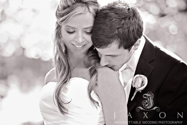 Groom tenderly kisses his new bride on her shoulder as she smiles | Flint Hill Wedding, natalia