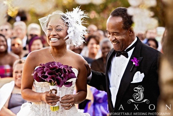 Bride and her father shares a laugh as he escorts her in the garden ceremony | Atlanta Botanical Gardens Wedding