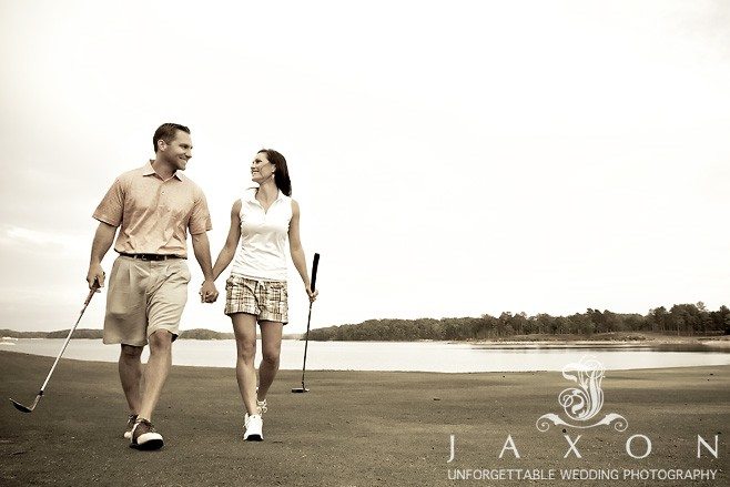 Couple walks hand in had after teeing off on the golf course at Lake Lanier
