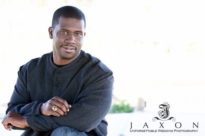 Portrait of African American male in long sleeve black knit shirt
