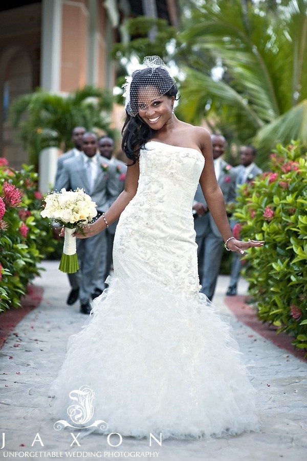 Bride pursued by groomsmen in Punta Cana