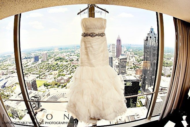 Brides wedding dress in the window at Westin Peachtree 200 Peachtree Wedding | Wedding Channel