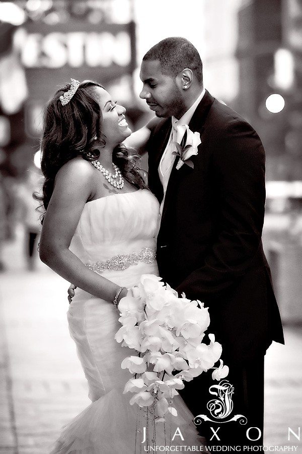 Couple on Peachtree st outside 200 Peachtree Wedding | Published by the Knot's Wedding Channel