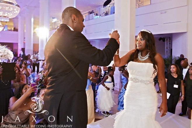 Bride and groom toast at 200 Peachtree Wedding | Published by the Knot's Wedding Channel
