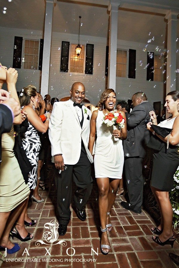 Bride and groom exits wedding between bubbles | Flint Hill Wedding 