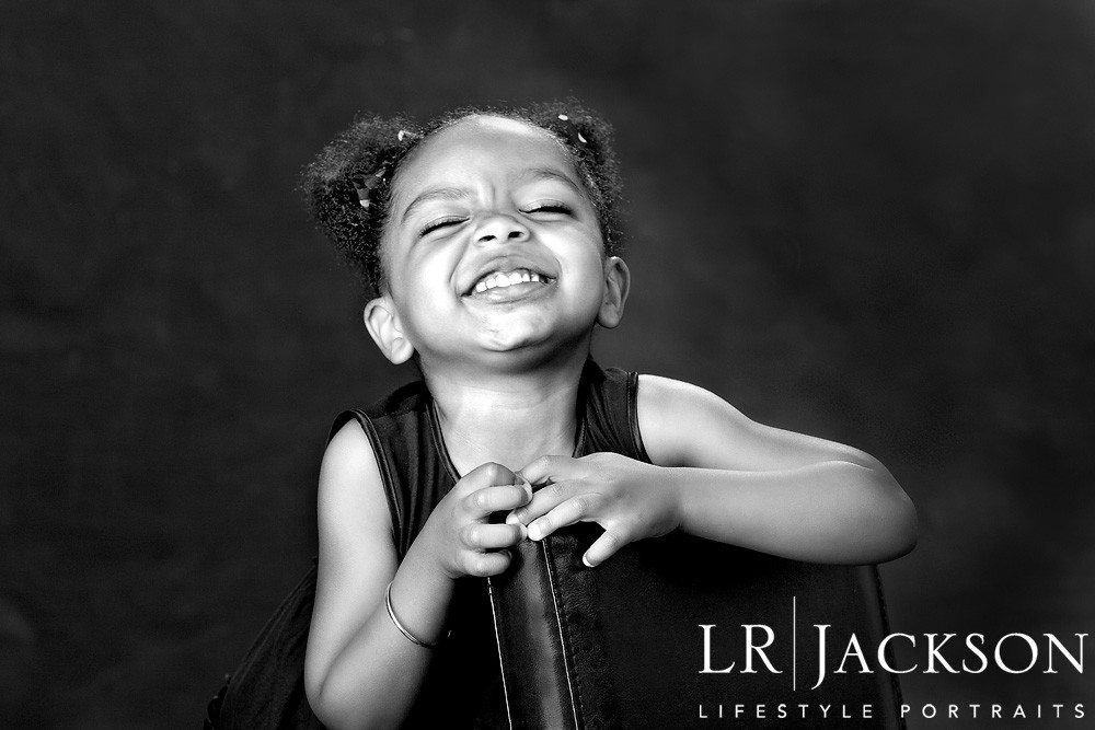 4yr old enjoying a laugh during portrait session