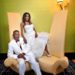 Bride and groom on fancy chair at Marriott Gateway Atlanta wedding