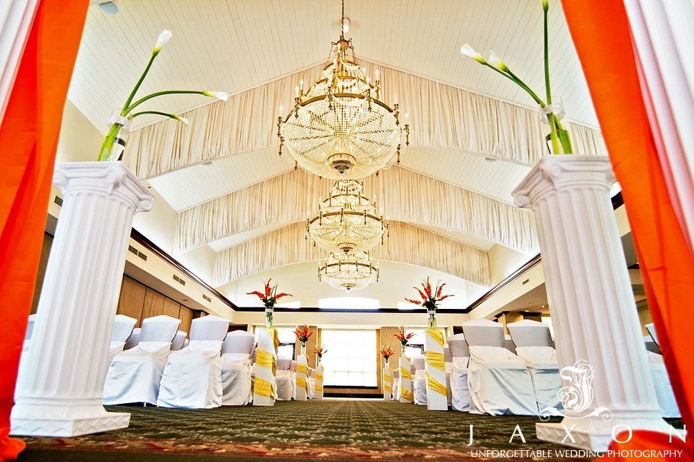 The main ballroom decorated in whites and yellow | Eagle's Landing Country Club Wedding