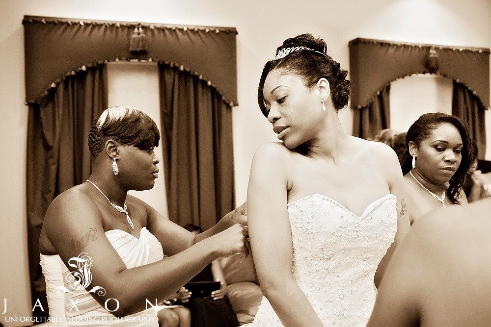 Bride's party applies finishing touches before wedding