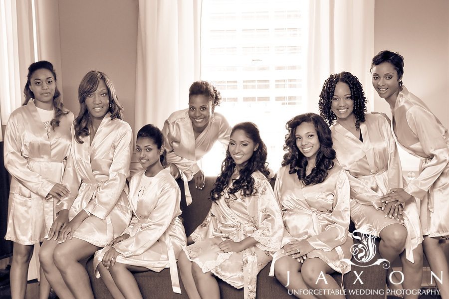 Sepia portrait of bride and her party in matching robes