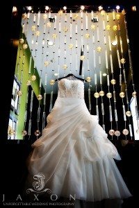 Choosing Your Photographer | Wedding dress hanging in the lobby at Atlanta Airport Gateway Marriott