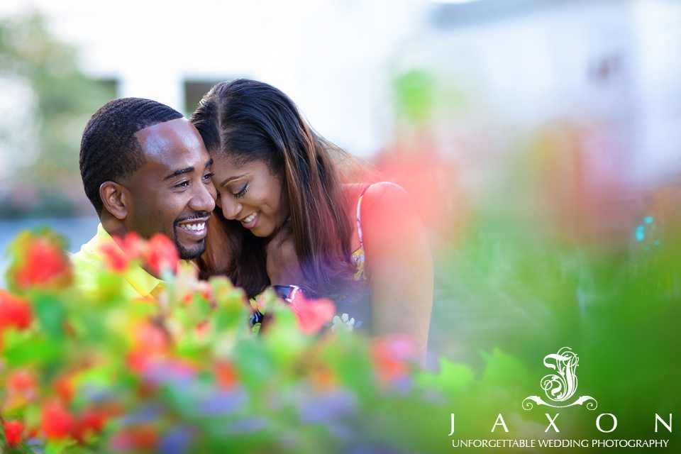 Couple sharing a laugh amongst the colorful flowers at Woodruff Park in downtown Atlanta
