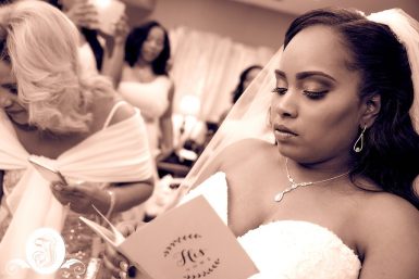 Bride reads message from groom
