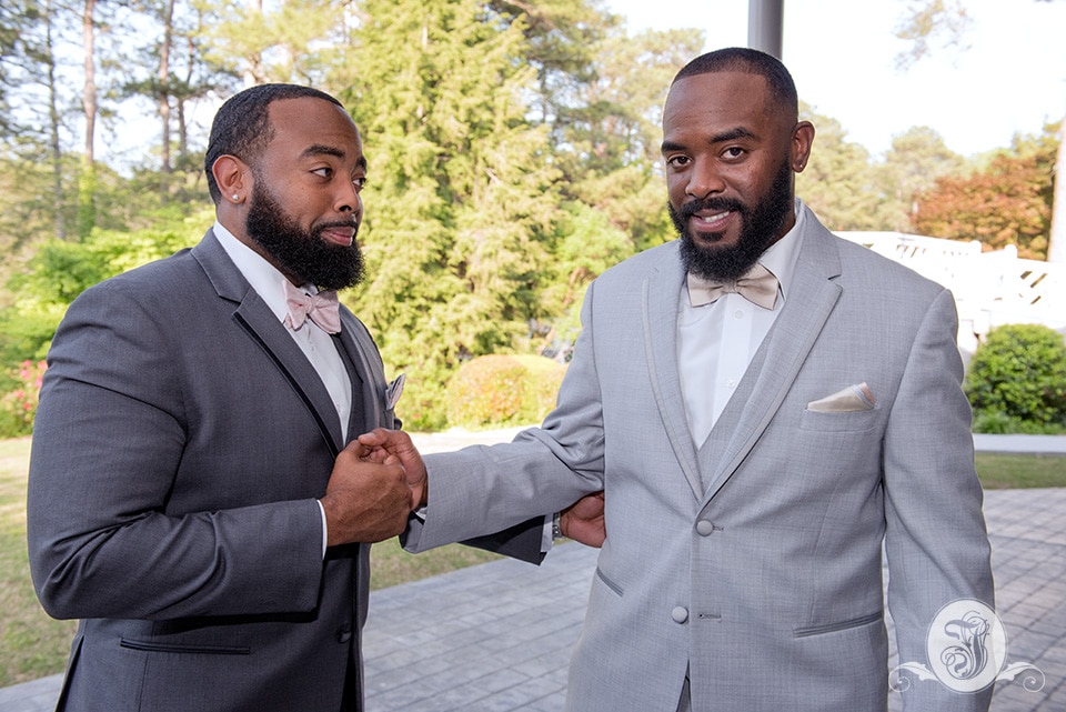 Best man and groom in gray tux