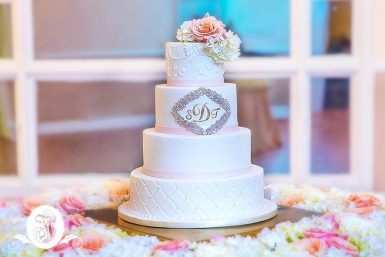 four-tiered round wedding cake