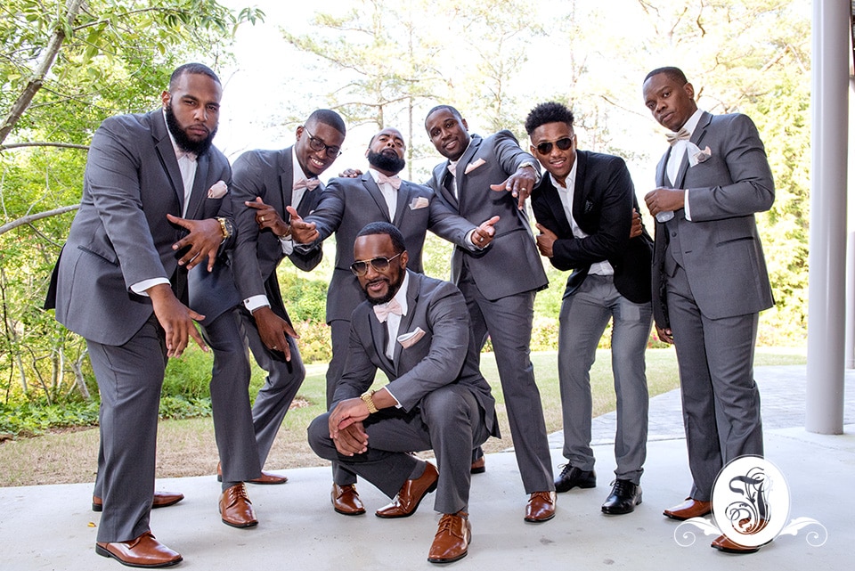 grooms men celebrate