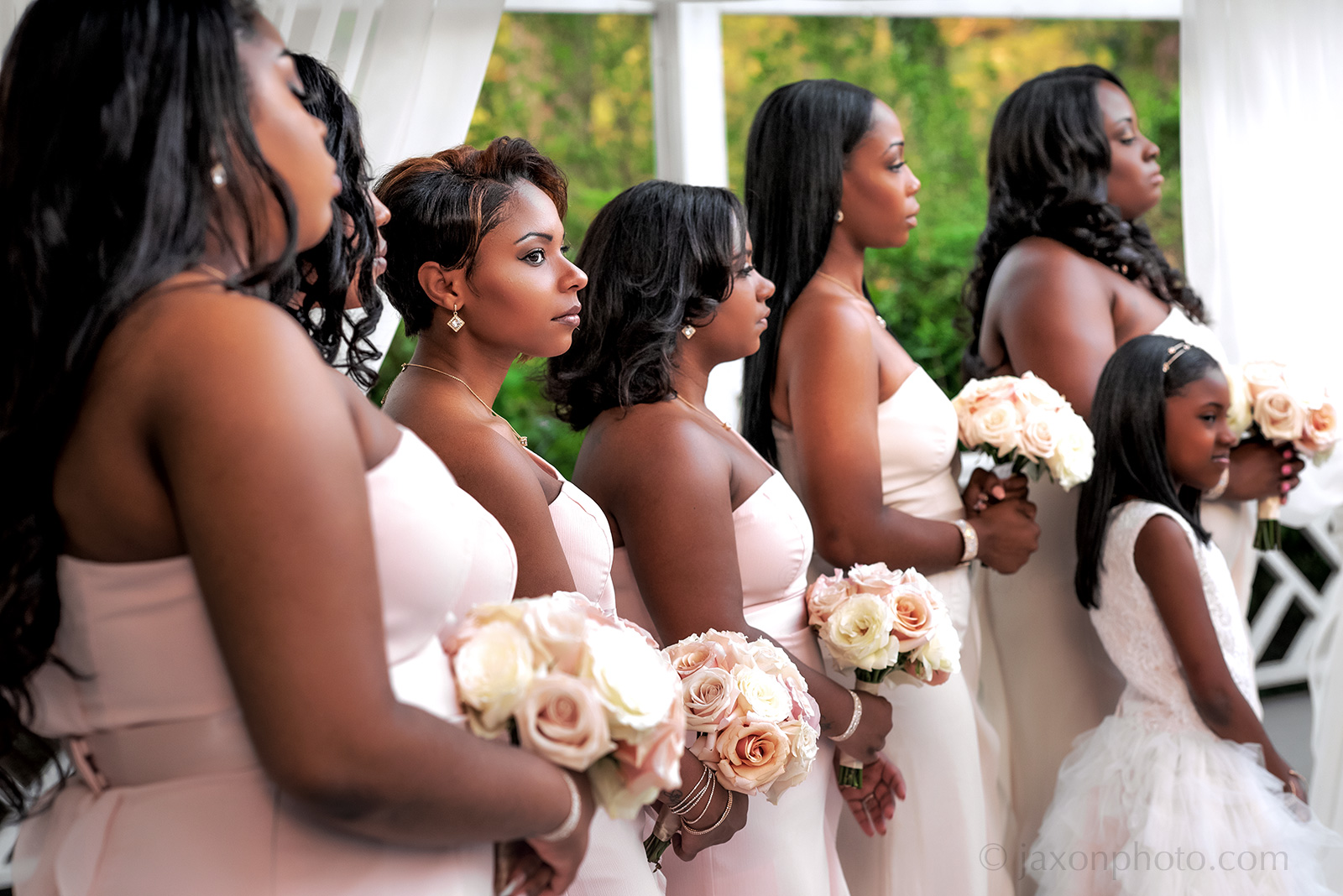 Bridesmaids in strapless blush gowns at Arbor Patio