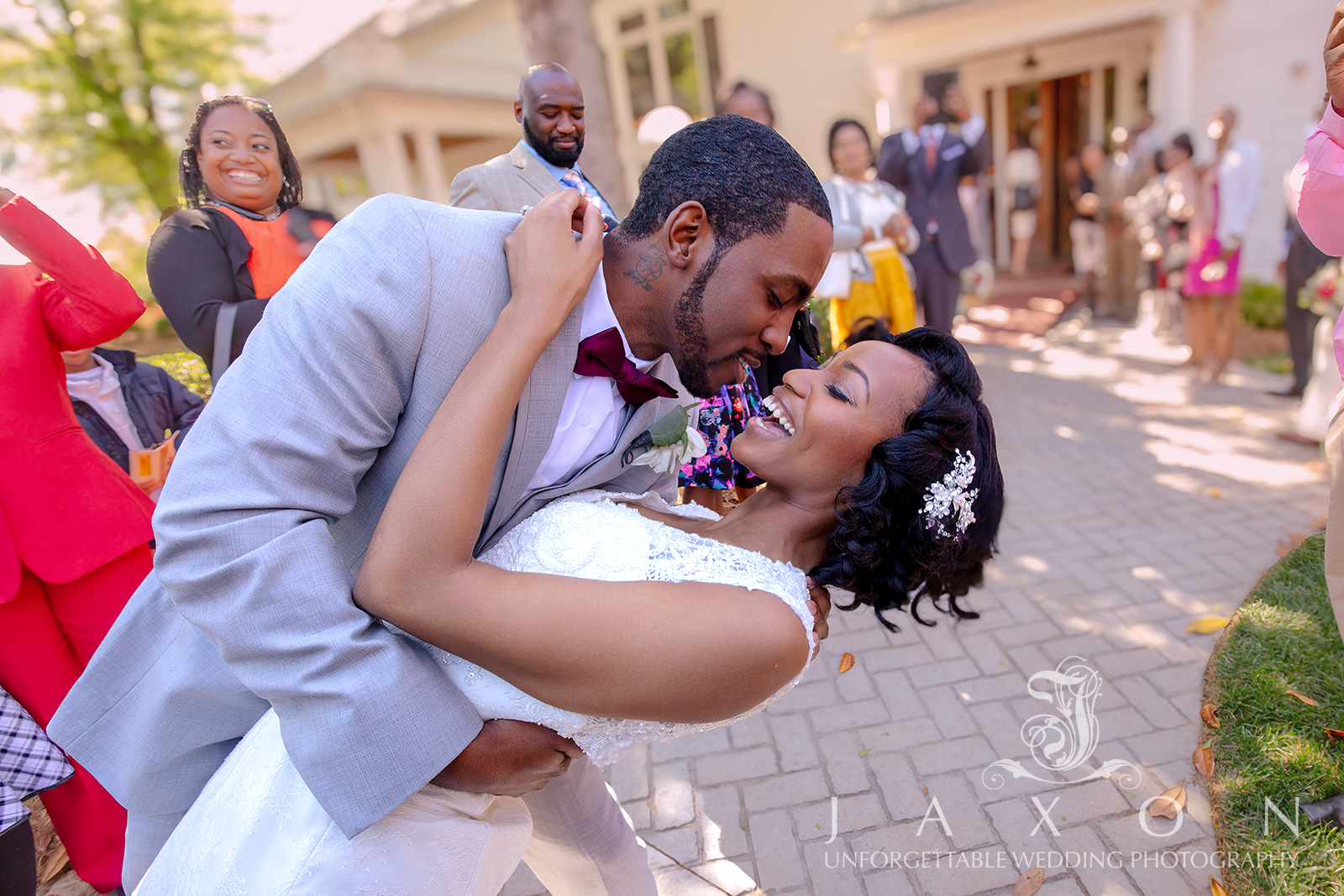 Newlyweds shares a kiss at Carl House wedding