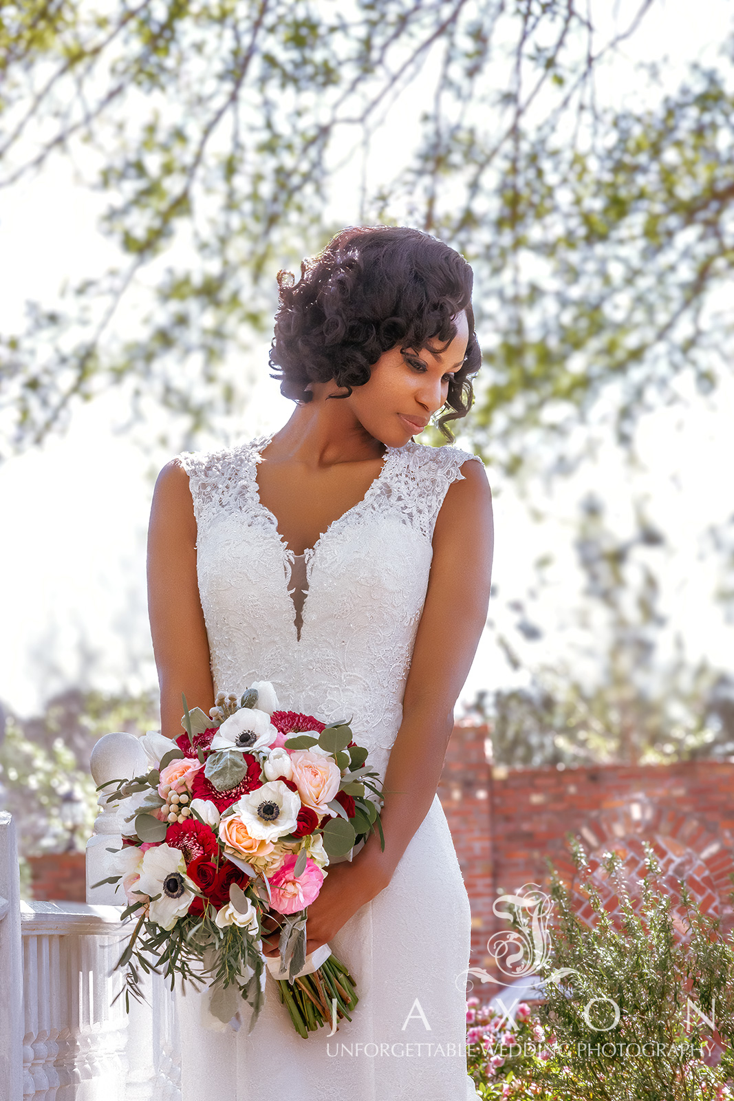 A soft moody portrait of a bride in the gardens at Carl House Atlanta